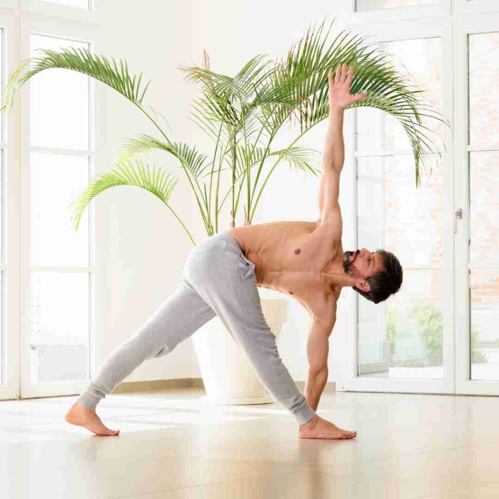 men doing Triangle Pose (Trikonasana)